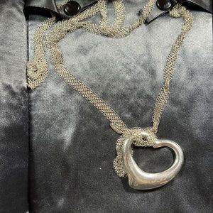 Tiffany and Co Elsa Open Heart necklace.